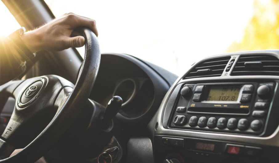 man driving a vehicle